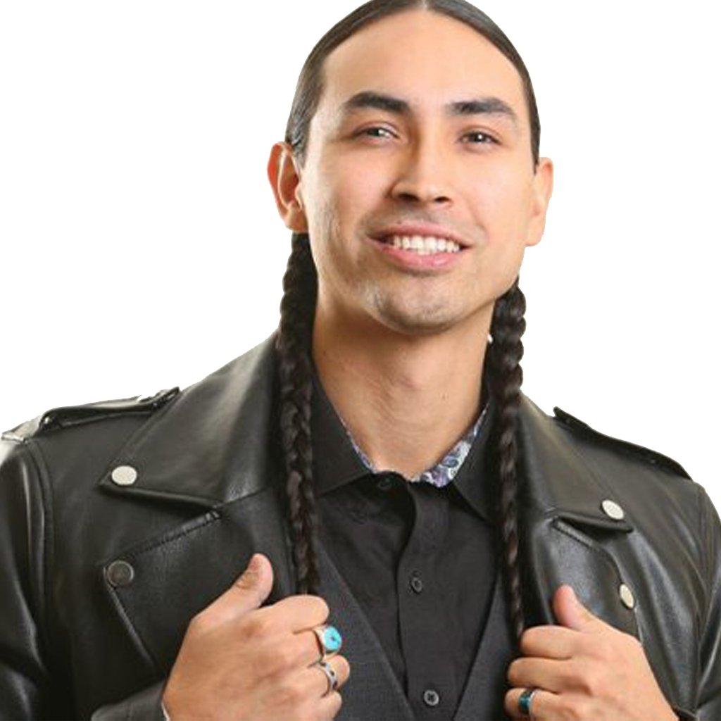 Tatanka Means, a Native American actor and comedian, smiling confidently at the camera.